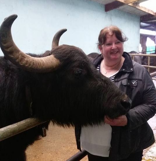 Michelle Chappell with a buffalo.